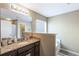 Bathroom with a granite countertop vanity and separate tub and shower at 102 Hill Crest Cir, Hiram, GA 30141
