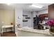 Bright kitchen features granite countertops, modern appliances, and ample storage at 102 Hill Crest Cir, Hiram, GA 30141