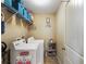 Laundry room with a washer, dryer, and wire shelving for storage at 102 Hill Crest Cir, Hiram, GA 30141