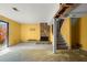 Unfinished basement with a stone fireplace and open staircase at 1784 Timber Valley Se Way, Smyrna, GA 30080