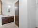 Bathroom vanity featuring a sink and storage cabinets with a mirror at 1784 Timber Valley Se Way, Smyrna, GA 30080