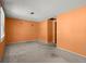 Simple bedroom with vibrant walls and a door, offering renovation potential at 1784 Timber Valley Se Way, Smyrna, GA 30080