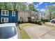 Charming townhomes with inviting curb appeal, neat landscaping, and convenient parking spaces at 1784 Timber Valley Se Way, Smyrna, GA 30080