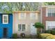 Charming townhouse featuring a well-maintained front yard and classic architecture at 1784 Timber Valley Se Way, Smyrna, GA 30080