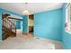 Living room featuring a staircase, blue walls and view to other parts of home at 1784 Timber Valley Se Way, Smyrna, GA 30080