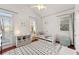 Bright bedroom with stylish decor, natural light, and a cozy atmosphere, perfect for a retreat at 2580 Defoors Ferry Nw Rd, Atlanta, GA 30318