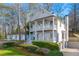 Gorgeous two story home with dual decks and an attached two car garage is landscaped to perfection at 2580 Defoors Ferry Nw Rd, Atlanta, GA 30318