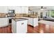 Spacious kitchen featuring stainless steel appliances and a center island at 2580 Defoors Ferry Nw Rd, Atlanta, GA 30318