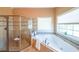 Bathroom features a spacious shower and a large soaking tub at 3230 Letha Woods Dr, Conyers, GA 30094