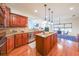 Well-equipped kitchen featuring granite counters, stainless steel appliances, and breakfast bar at 3230 Letha Woods Dr, Conyers, GA 30094