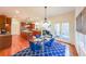 Bright kitchen with island and breakfast area with access to the outside at 3230 Letha Woods Dr, Conyers, GA 30094