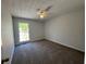 Cozy bedroom with neutral walls, carpet and bright window for lots of natural light at 3861 Spring Meadow Dr, Acworth, GA 30101
