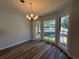 Cozy dining room with bay windows offering natural light and neighborhood views at 3861 Spring Meadow Dr, Acworth, GA 30101