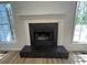 Classic fireplace with black marble surround and hearth at 3861 Spring Meadow Dr, Acworth, GA 30101