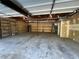 Spacious garage featuring ample storage shelving and a multi-car garage door at 3861 Spring Meadow Dr, Acworth, GA 30101