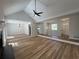 Spacious open-concept living room with vaulted ceiling and fireplace at 3861 Spring Meadow Dr, Acworth, GA 30101