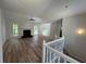 Bright living room with fireplace, vaulted ceiling, and hardwood floors at 3861 Spring Meadow Dr, Acworth, GA 30101