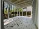 Screened-in back porch showing a secluded backyard and wooded lot at 3861 Spring Meadow Dr, Acworth, GA 30101