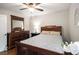 Charming bedroom with neutral colors, hardwood flooring, and decorative touches at 4715 Howard Dr, Powder Springs, GA 30127