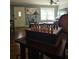 Cozy living room with a chessboard, offering a relaxing space for leisure activities with natural light at 4715 Howard Dr, Powder Springs, GA 30127