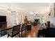 Inviting living room with hardwood floors, ceiling fans, fireplace and stylish furniture, creating a comfortable atmosphere at 4715 Howard Dr, Powder Springs, GA 30127