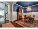 Dining room featuring a blue ceiling and hardwood floors at 144 Park Dr, Decatur, GA 30030