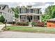 Charming two-story home with a welcoming front porch and beautifully landscaped yard at 144 Park Dr, Decatur, GA 30030