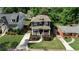 Well-maintained two-story home with a landscaped yard and inviting front porch at 144 Park Dr, Decatur, GA 30030