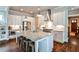 Modern kitchen with a large island, stainless steel appliances, and white cabinets at 144 Park Dr, Decatur, GA 30030