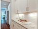 Kitchen detail showcasing granite countertops and white cabinets at 144 Park Dr, Decatur, GA 30030