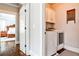 Convenient laundry room features a washer and dryer, storage cabinets, and stylish decor at 144 Park Dr, Decatur, GA 30030
