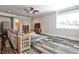 Spacious basement living room with a plush sofa, and an entertainment center perfect for relaxing and entertainment at 144 Park Dr, Decatur, GA 30030