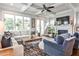 Bright living room with coffered ceilings, large windows, fireplace, and comfortable seating at 144 Park Dr, Decatur, GA 30030
