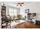 Cozy living room with hardwood floors, neutral colors, and plenty of natural light perfect for relaxing or working from home at 144 Park Dr, Decatur, GA 30030