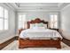 Serene main bedroom features large windows, a plush bed, and elegant bedside tables at 144 Park Dr, Decatur, GA 30030