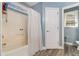 Bathroom featuring a shower/tub combo and white walls at 2505 Rockmart Rd, Villa Rica, GA 30180
