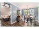 Bright breakfast nook with a round table, chairs, and a view of the outdoors at 2505 Rockmart Rd, Villa Rica, GA 30180