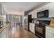 Charming kitchen with stainless steel appliances and an adjacent dining area at 2505 Rockmart Rd, Villa Rica, GA 30180