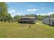 Enjoy the large wooden deck overlooking the backyard with lush landscaping and mature trees at 2816 Pine Meadow Dr, Marietta, GA 30066