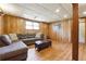 Finished basement features comfortable seating, laminate flooring, and a bright window at 2816 Pine Meadow Dr, Marietta, GA 30066