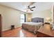 Comfortable bedroom with warm hardwood floors and lots of light from the window at 2816 Pine Meadow Dr, Marietta, GA 30066