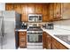Kitchen featuring stainless steel appliances, and beautiful wood cabinets at 2816 Pine Meadow Dr, Marietta, GA 30066