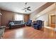 Cozy living room with wood floors, a large window, and comfortable seating at 2816 Pine Meadow Dr, Marietta, GA 30066