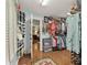 Walk-in closet with custom shelving provides ample storage for clothes and accessories at 305 Spindle Ct, Sandy Springs, GA 30350