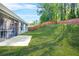 Backyard with fenced in area and well manicured lawn is perfect for entertaining at 790 Riverwood Pass, Dallas, GA 30157
