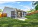 Well-maintained backyard with screened in porch is perfect for relaxing at 790 Riverwood Pass, Dallas, GA 30157