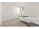 Bright bedroom with large double door closet and neutral carpet at 790 Riverwood Pass, Dallas, GA 30157