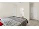 Cozy bedroom offering a glimpse into an ensuite bathroom, with ample space for relaxation at 790 Riverwood Pass, Dallas, GA 30157