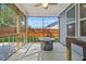 Screened patio with ceiling fan and view of backyard at 790 Riverwood Pass, Dallas, GA 30157