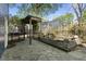 Landscaped backyard featuring a pond and stone walkway at 1195 Oglethorpe Ne Ave, Atlanta, GA 30319